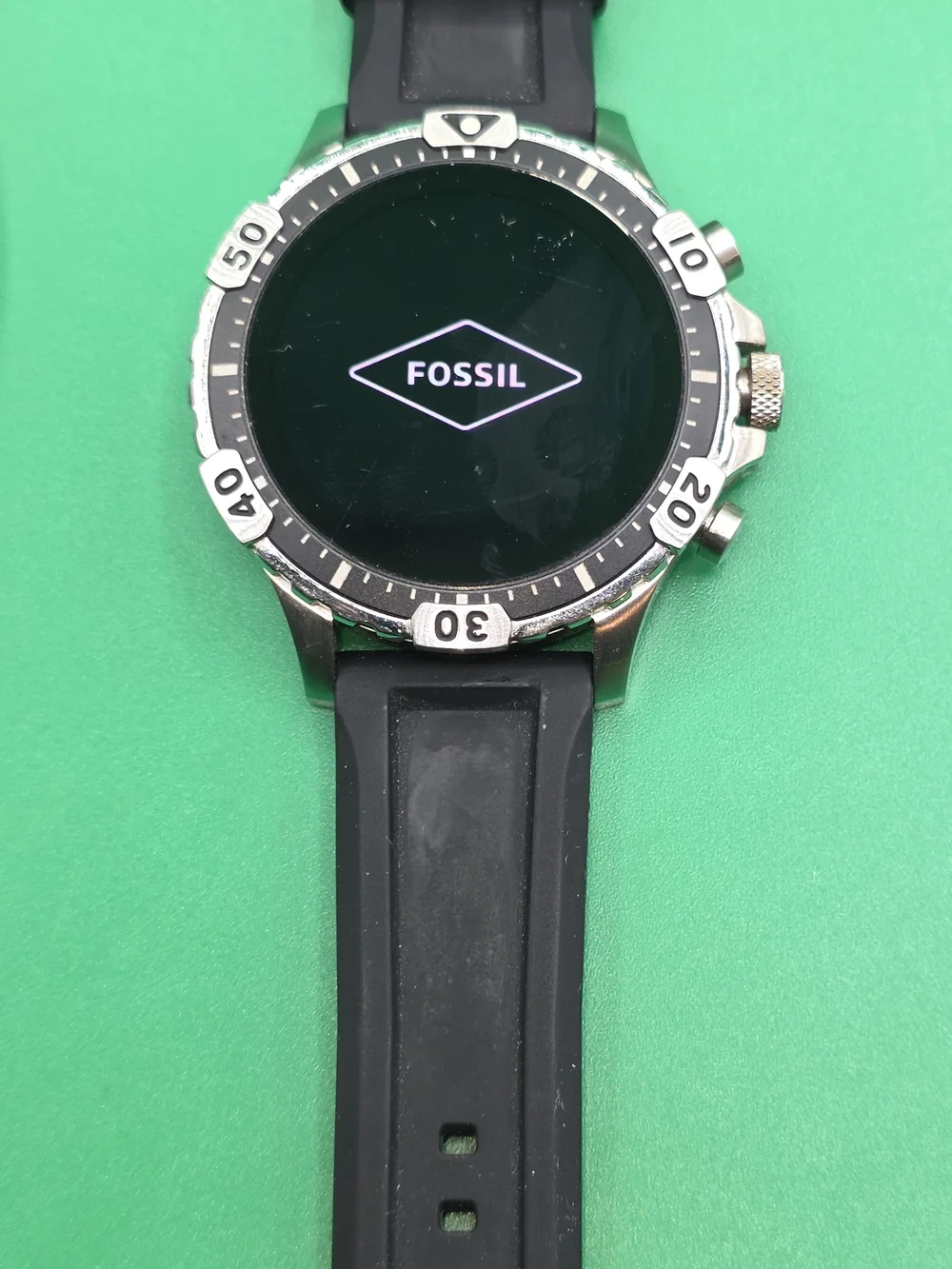 Fossil Gen 5 Garrett HR smartwatch with a black silicone strap